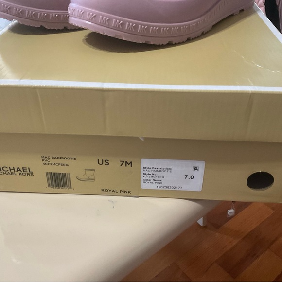 The Michael Kors rain boots in the image are light  lavender in color Final Sale - Picture 2 of 5